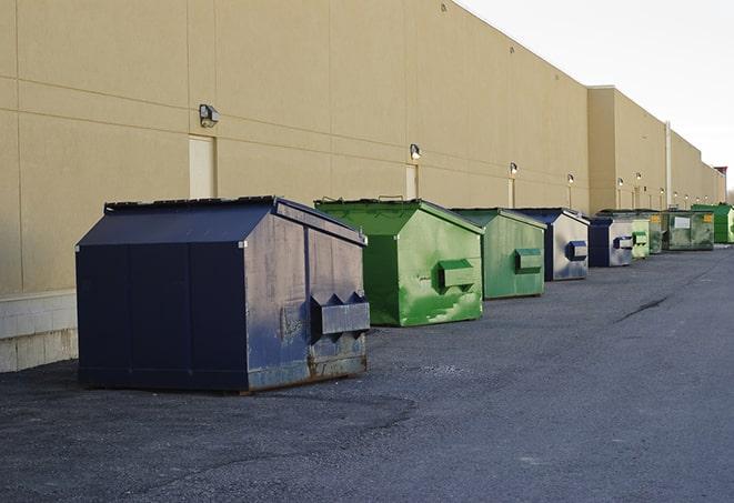 an aerial view of construction dumpsters placed on a large lot in Acworth GA